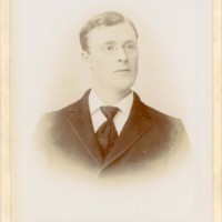 Portrait Photograph of Unidentified Man with Glasses